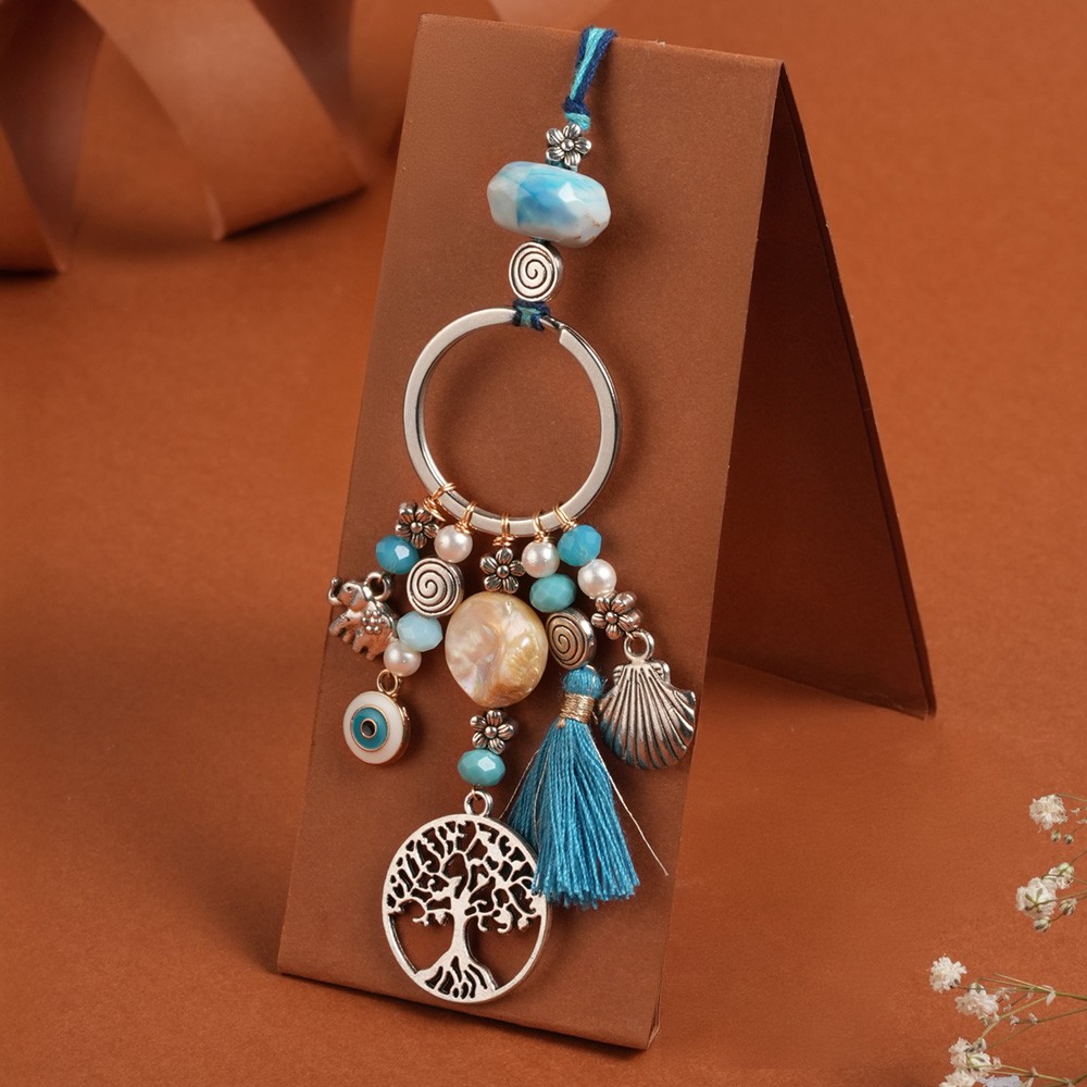 Evil Eye Lumba Rakhi (Light Blue) by Flower Aura